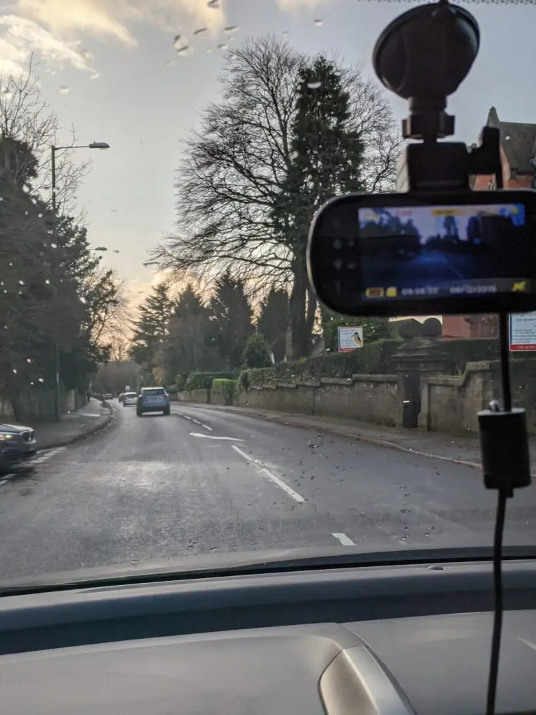 First dash cam setup example showing a Nextbase camera mounted on a windshield.